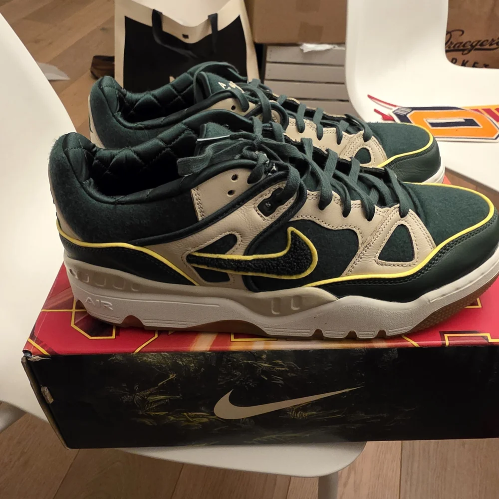 Nike: Nigo X Air Force 3 SP College Pack Forest Green.